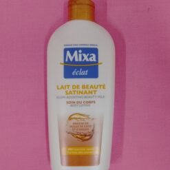 Lait de Beauté satinant MIXA ÉCLAT soin du corps enrichi en huiles de coco et d'argan 230ml