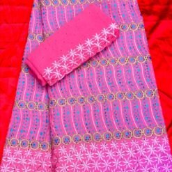 Tissu brodé en coton couleur rose foncé